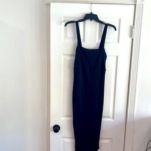 So flattering and sexy. Black cotton ribbed with lining.